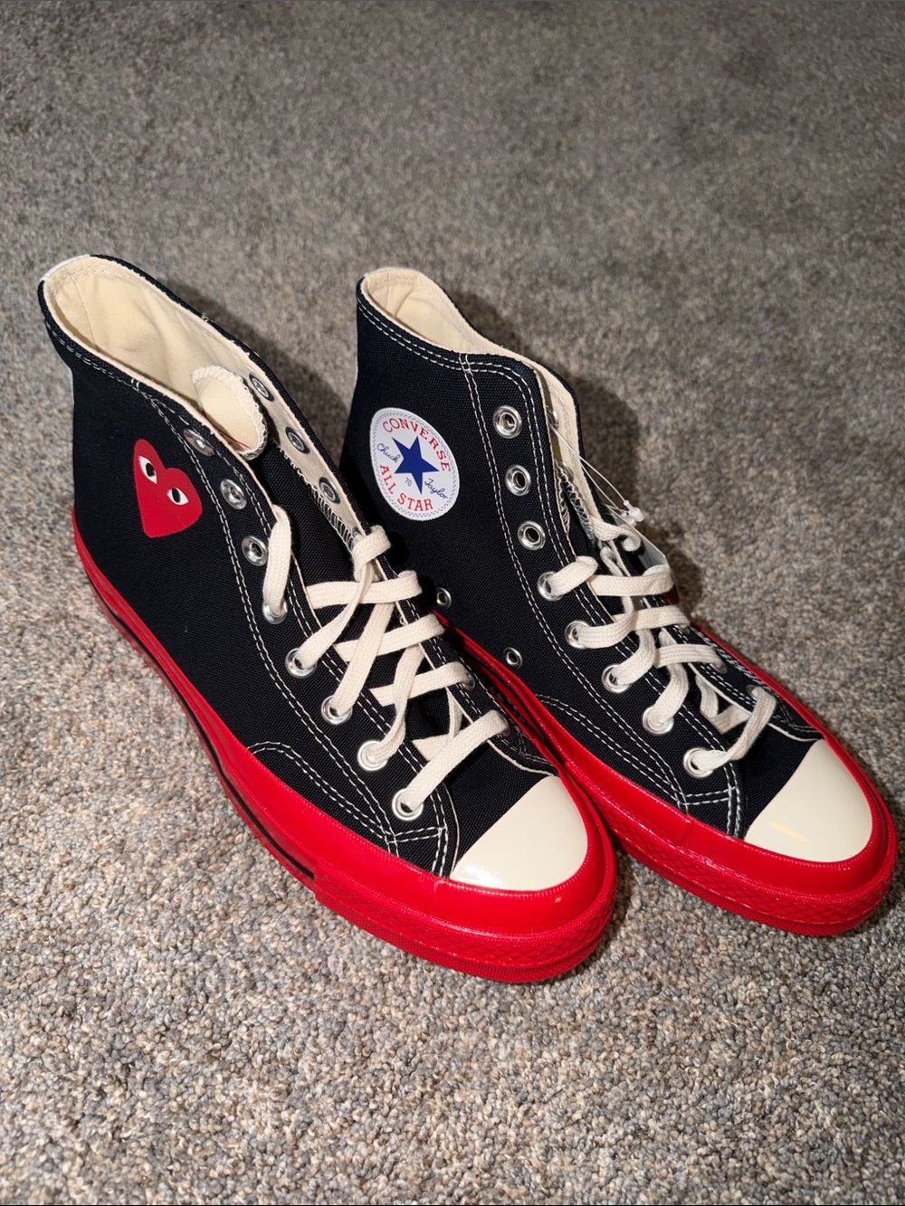 Comme des Garçons PLAY Black High-Top Sneakers with Red Sole